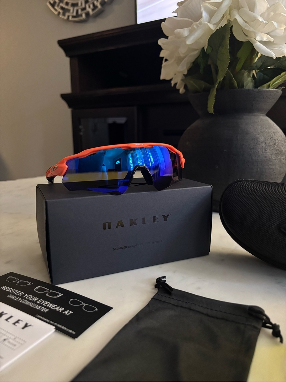 Oakley Sunglasses - Orange Frame with Blue Mirrored Lens